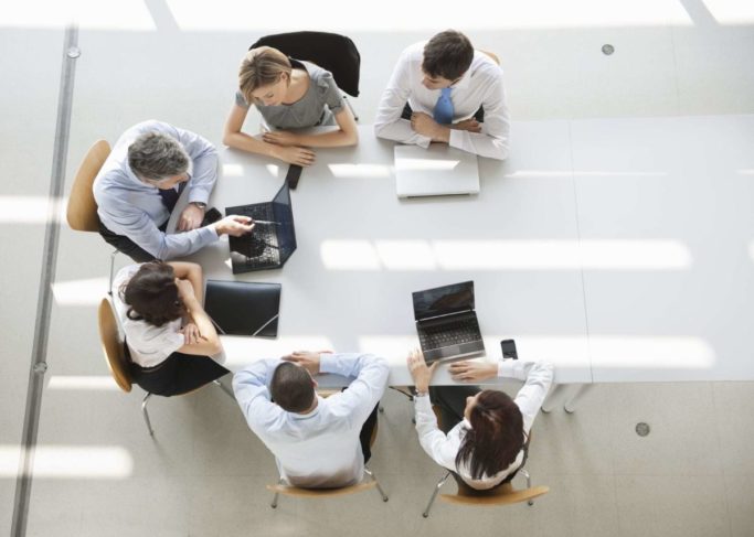 business-people-in-meeting Business Litigation